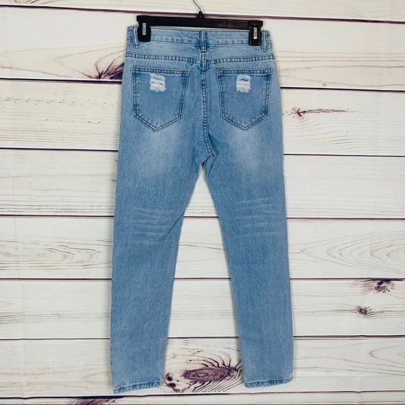 Light wash distressed boyfriend fit jean… - Picture 3 of 7